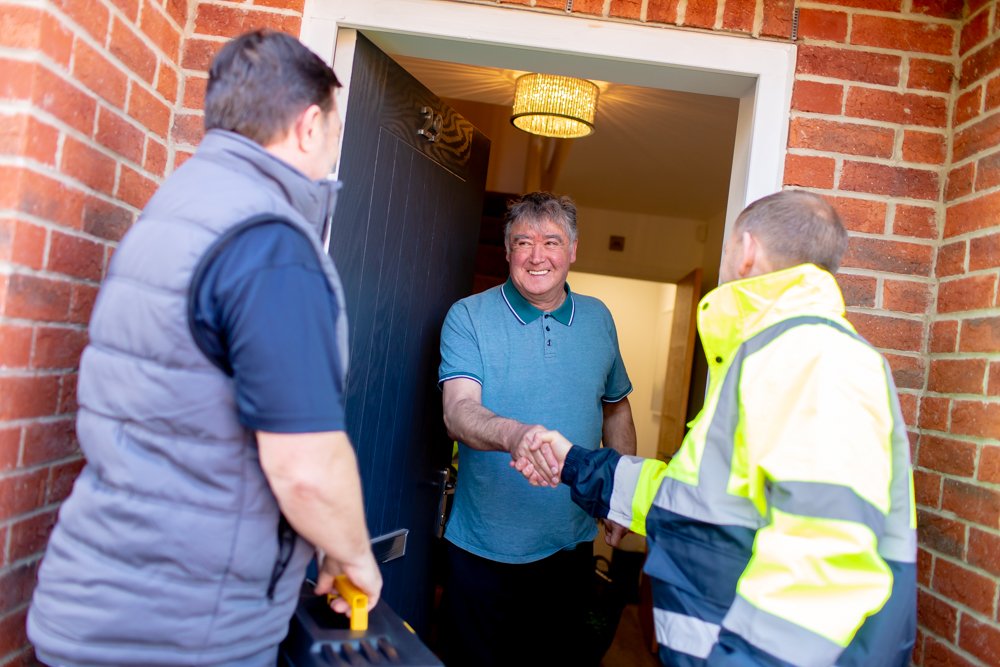 Livv Housing team meeting customer at front door