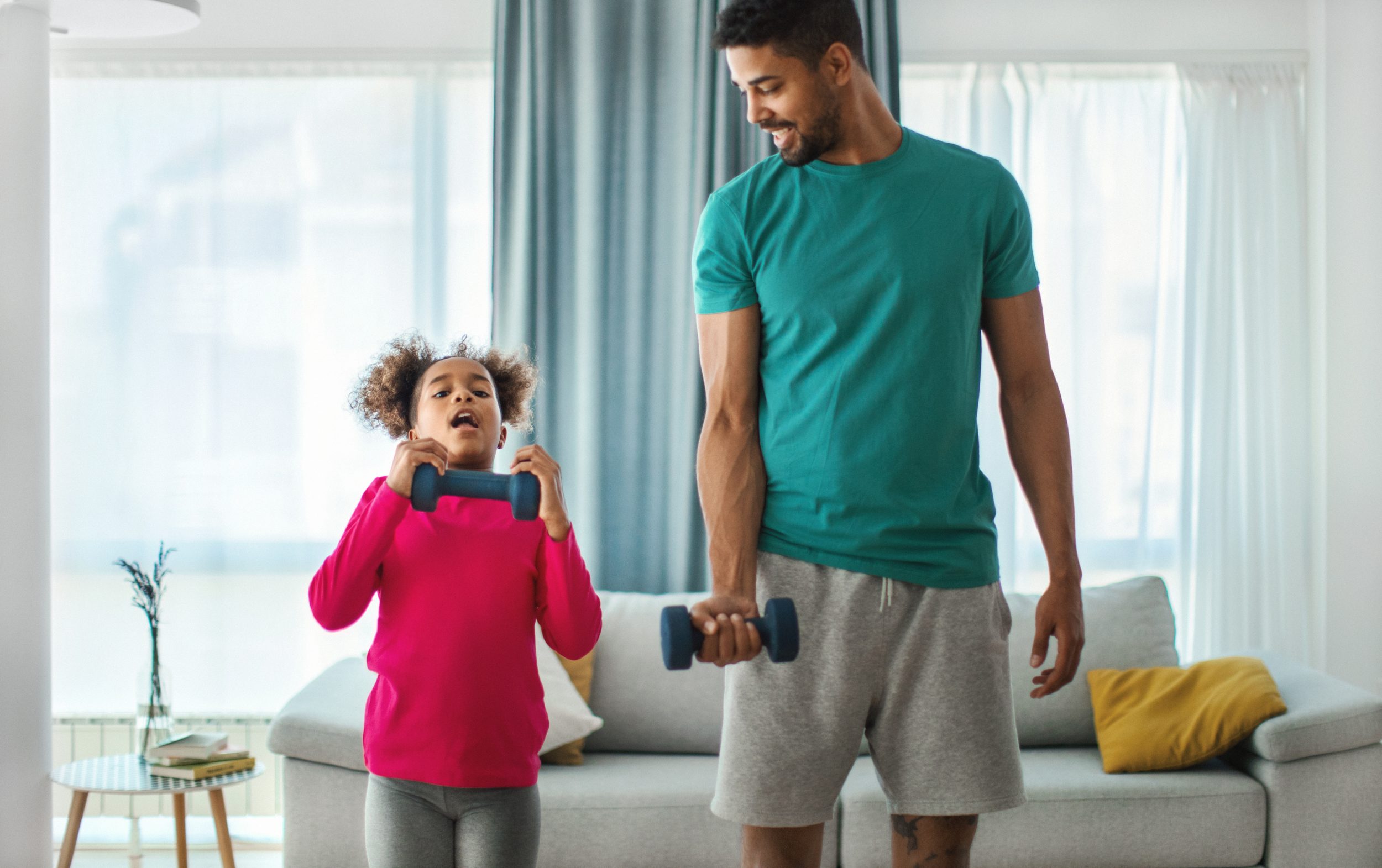 dad and daughter working out